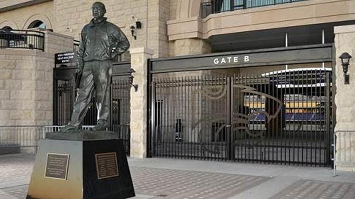The Bill Snyder statue in front of the Snyder Family Stadium west entrance.