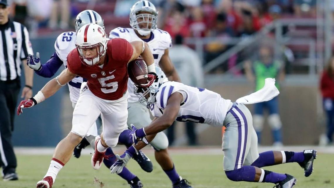 Former Stanford running back Christian McCaffrey carries against Kansas State during a football game in Palo Alto, Calif. (AP Photo/Marcio Jose Sanchez)
