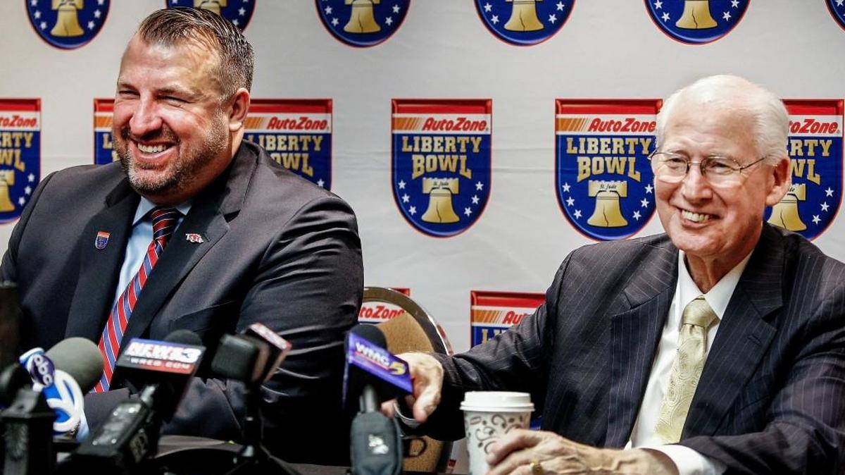 FILE - In this Dec. 10, 2015, file photo, Arkansas coach Bret Bielema, right, and Kansas State coach Bill Snyder discuss the Libery Bowl. (Mark Weber/The Commercial Appeal via AP, File) MANDATORY CREDIT