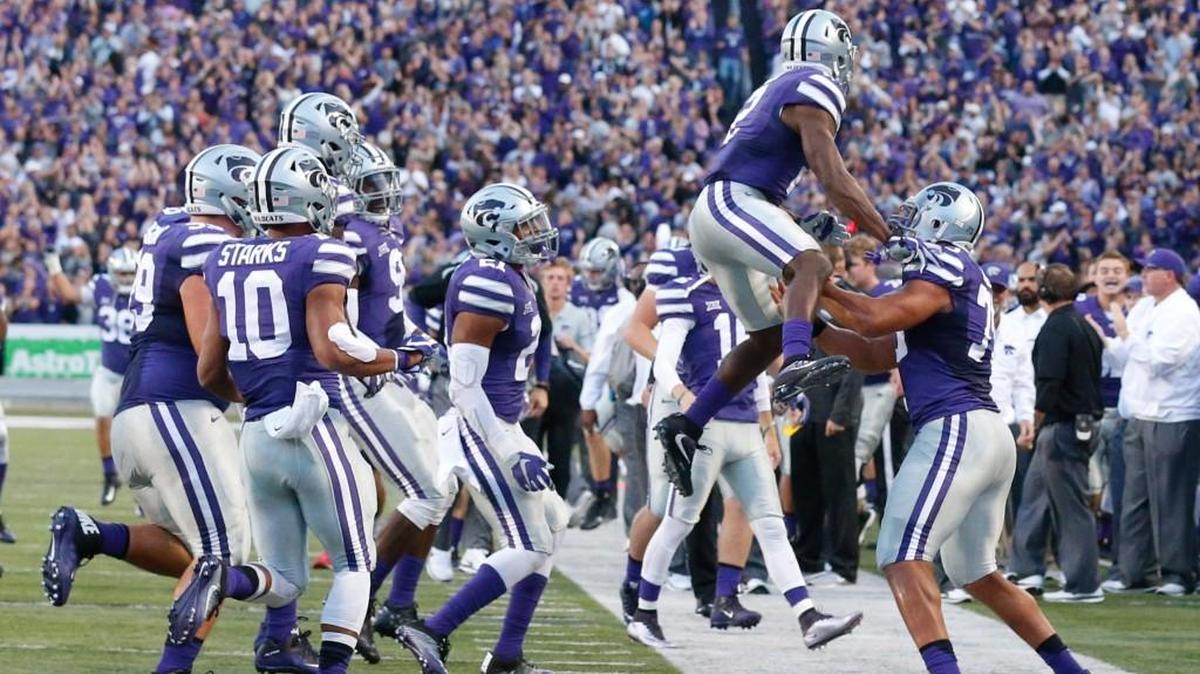 K-State defensive back DJ Reed celebrates his interception and touchdown Saturday night against Texas Tech.(October 8, 2016)