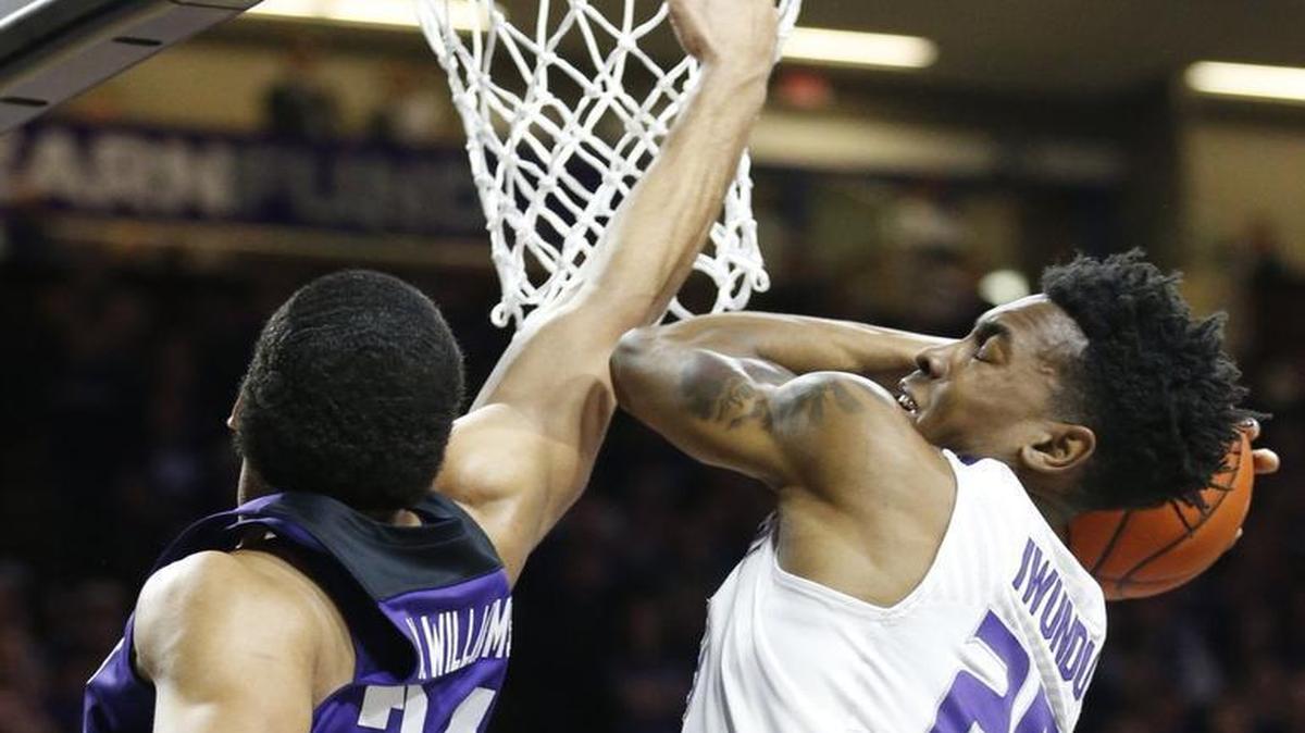 K-State forward Wesley Iwundu grabs a rebound from TCU’s Kenrich Williams during the first half Wednesday at Bramlage Coliseum in Manhattan.