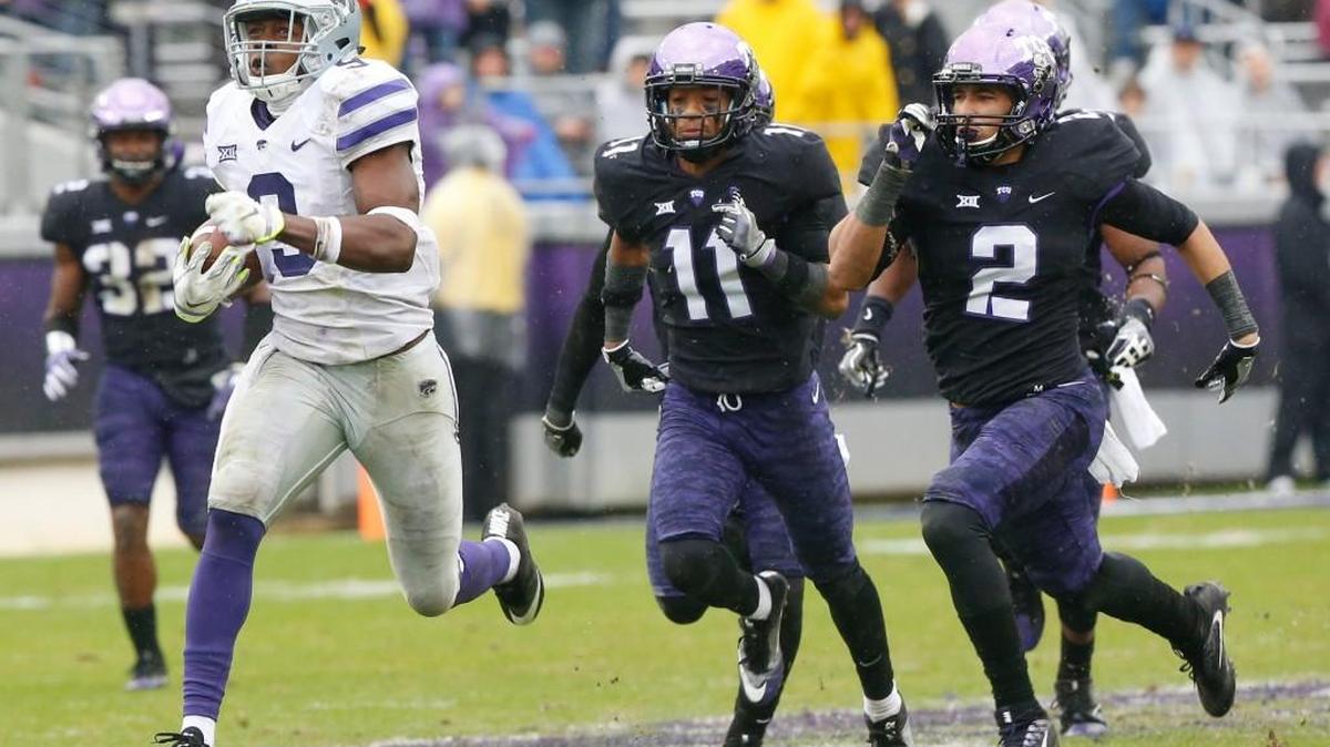 K-State wide receiver Byron Pringle runs for the end zone leaving TCU defenders in his wake after catching a Jesse Ertz pass. (December 3, 2016)