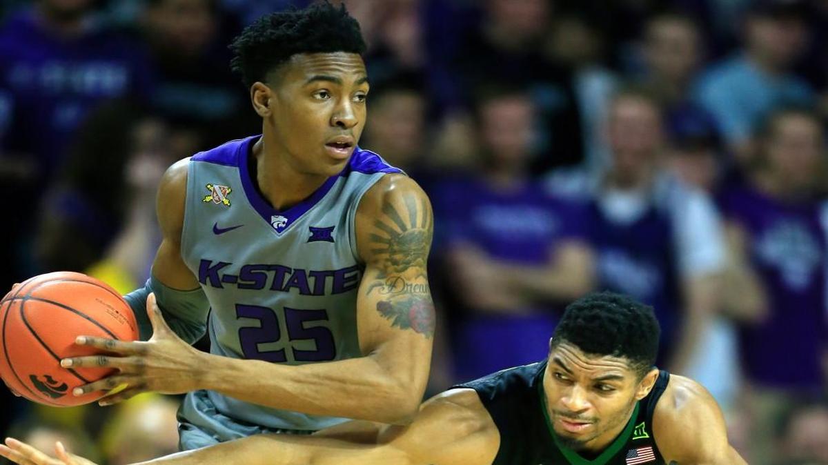 Baylor guard Al Freeman reaches in on Kansas State forward Wesley Iwundu during the first half Saturday in Manhattan.