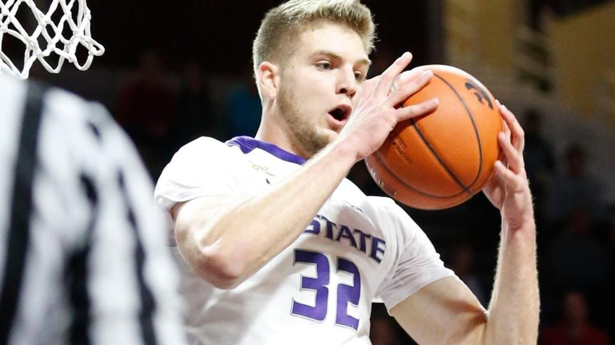 K-State forward Dean Wade grabs a rebound in the first against Robert Morris on Tuesday night in Manhattan.