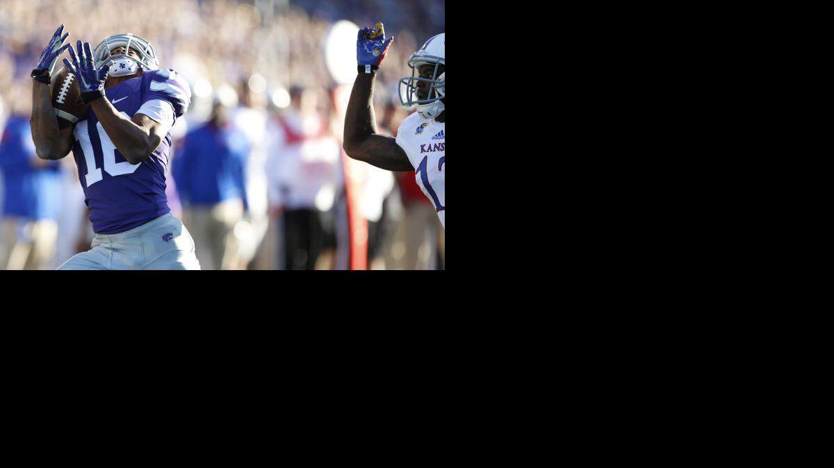 
K-State wide receiver Tyler Lockett hauls in a Jake Waters pass for a touchdown in the first quarter against Kansas on Saturday in Manhattan. Lockett broke his father’s career receptions record in the game.
