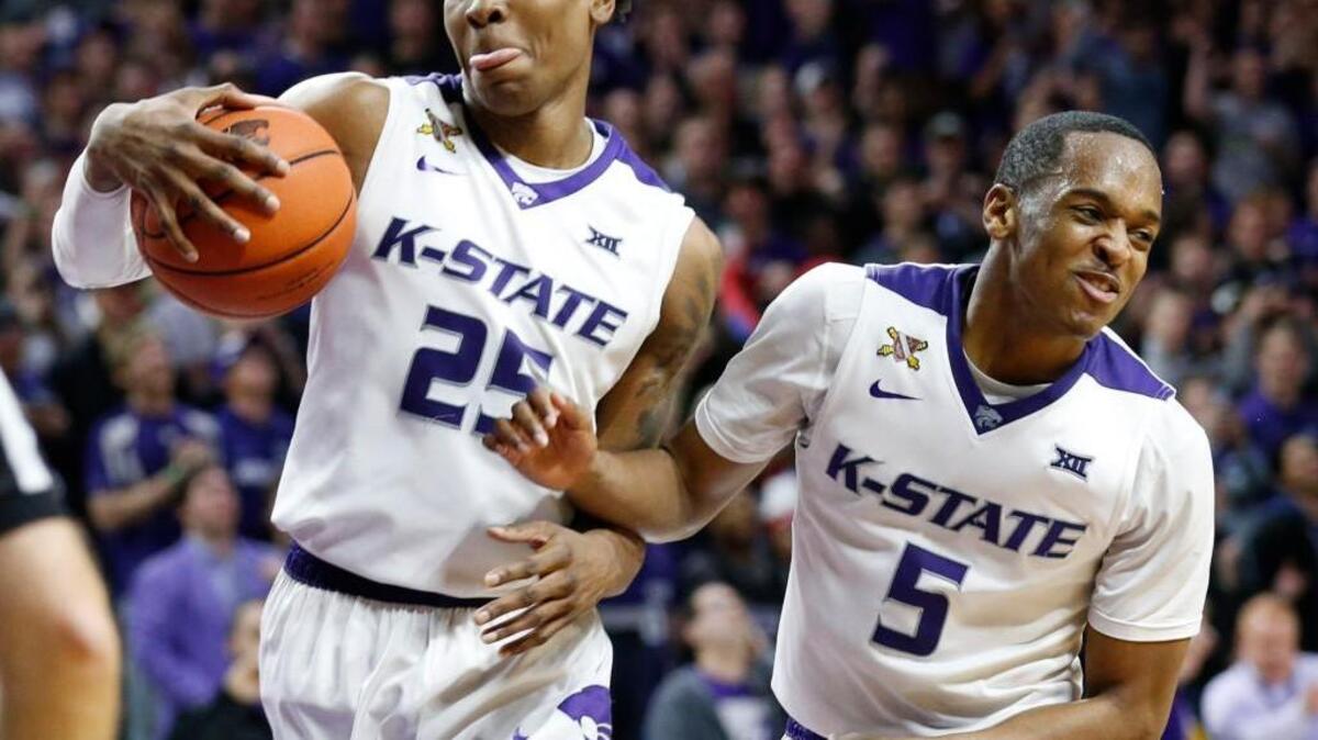 K-State forward Wesley Iwundu and guard Barry Brown celebrate their victory over Oklahoma in Bramlage Coliseum.(February 6, 2016)