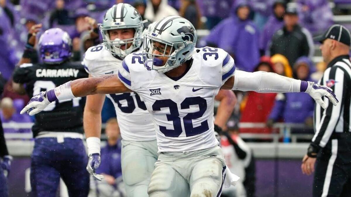 Kansas State running back Justin Silmon and tight end Dayton Valentine celebrate after Silmon ran for a touchdown against TCU on Dec. 3.