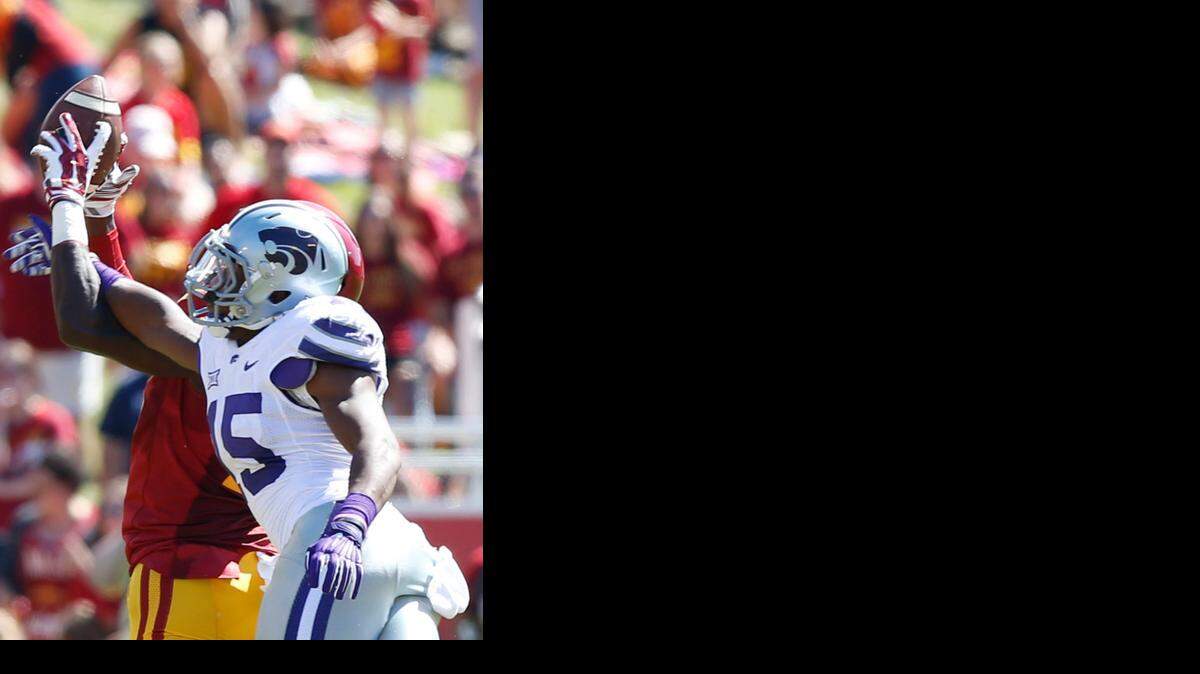 
Kansas State defensive back Randall Evans, right, knocks the ball away from a Iowa State receiver on Sept. 6 in Ames, Iowa.
