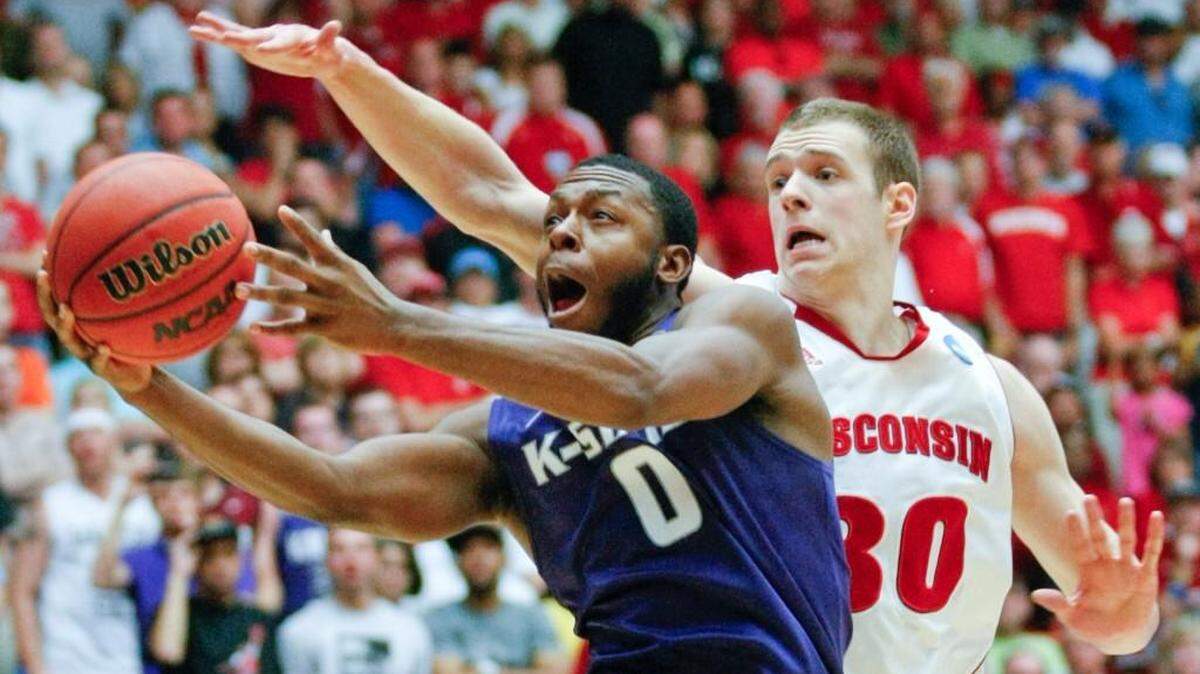 Former K-State guard Jacob Pullen goes to the basket in the NCAA Tournament against Wisconsin. (March. 17, 2011)