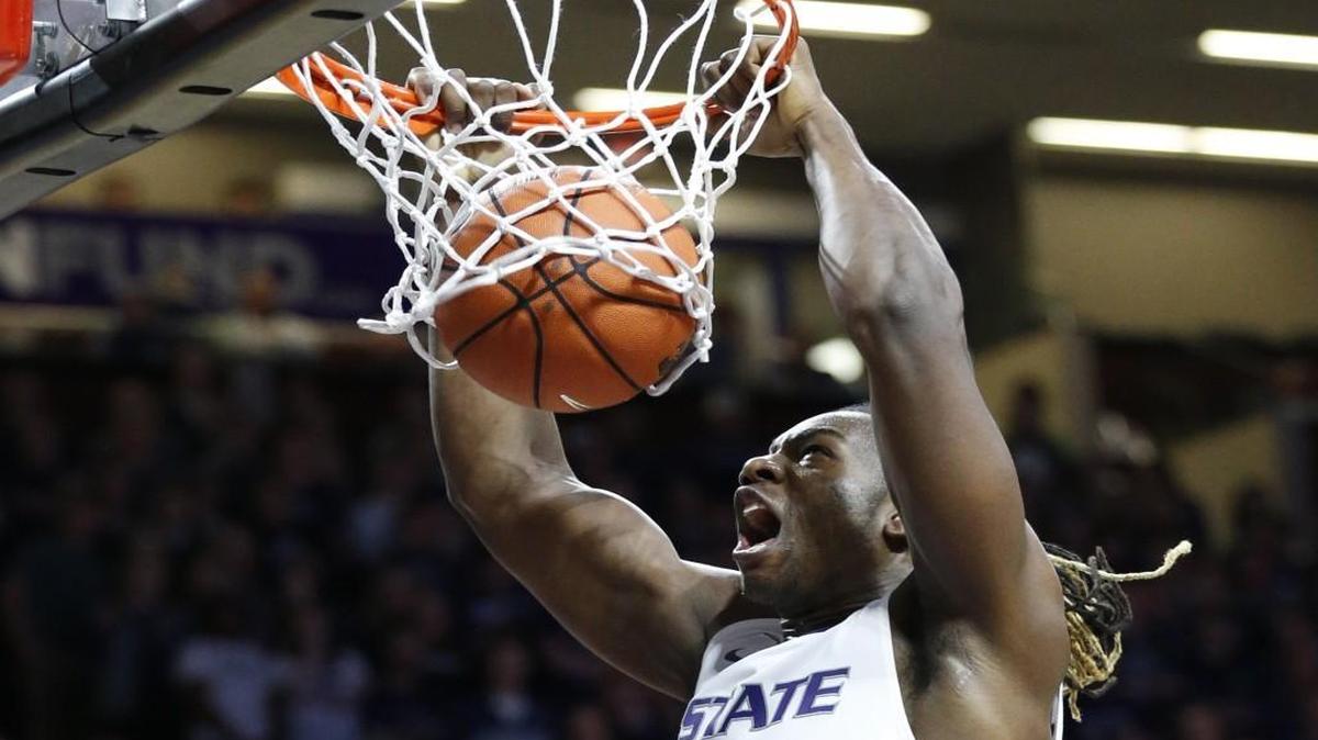 K-State forward D.J. Johnson slams in a dunk against Mississippi in the second half Saturday at Bramlage Coliseum. Johnson led K-State with 14 points.