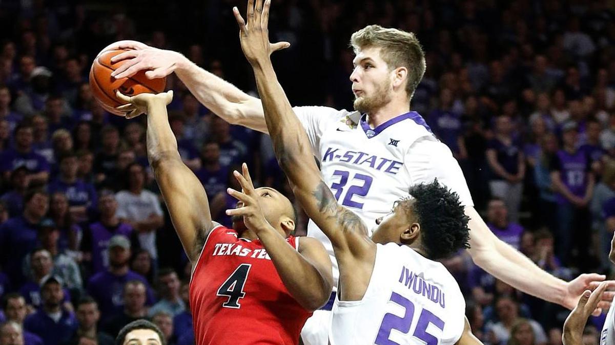K-State forward Dean Wade swats down a shot by Texas Tech guard Shadell Millinghaus (4) Saturday, March 4, 2017 at Bramlage Coliseum in Manhattan, Kan. Kansas State won 48-61. (Bo Rader/Wichita Eagle/TNS)