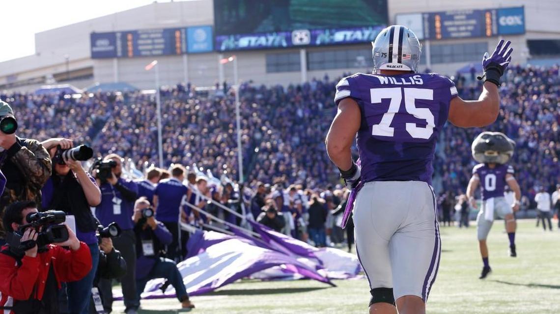 Senior K-State defensive end Jordan Willis takes the field before the final regular-season game against Kansas in Manhattan.
