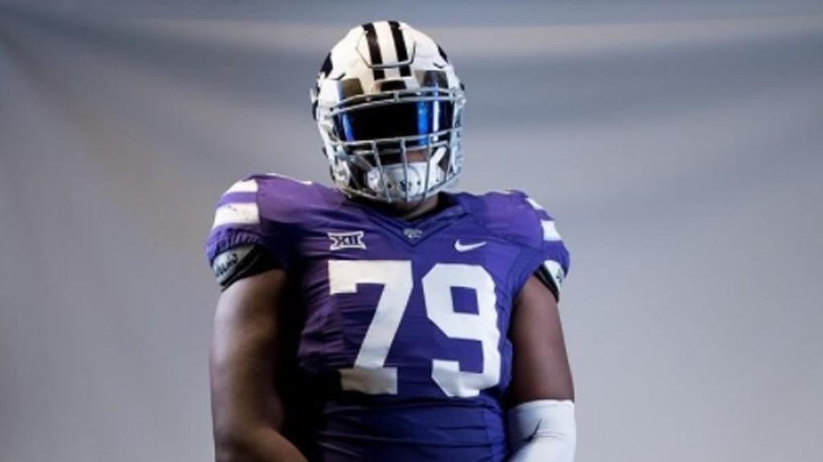 Tyquilo Moore poses for a photo while on a K-State recruiting visit.