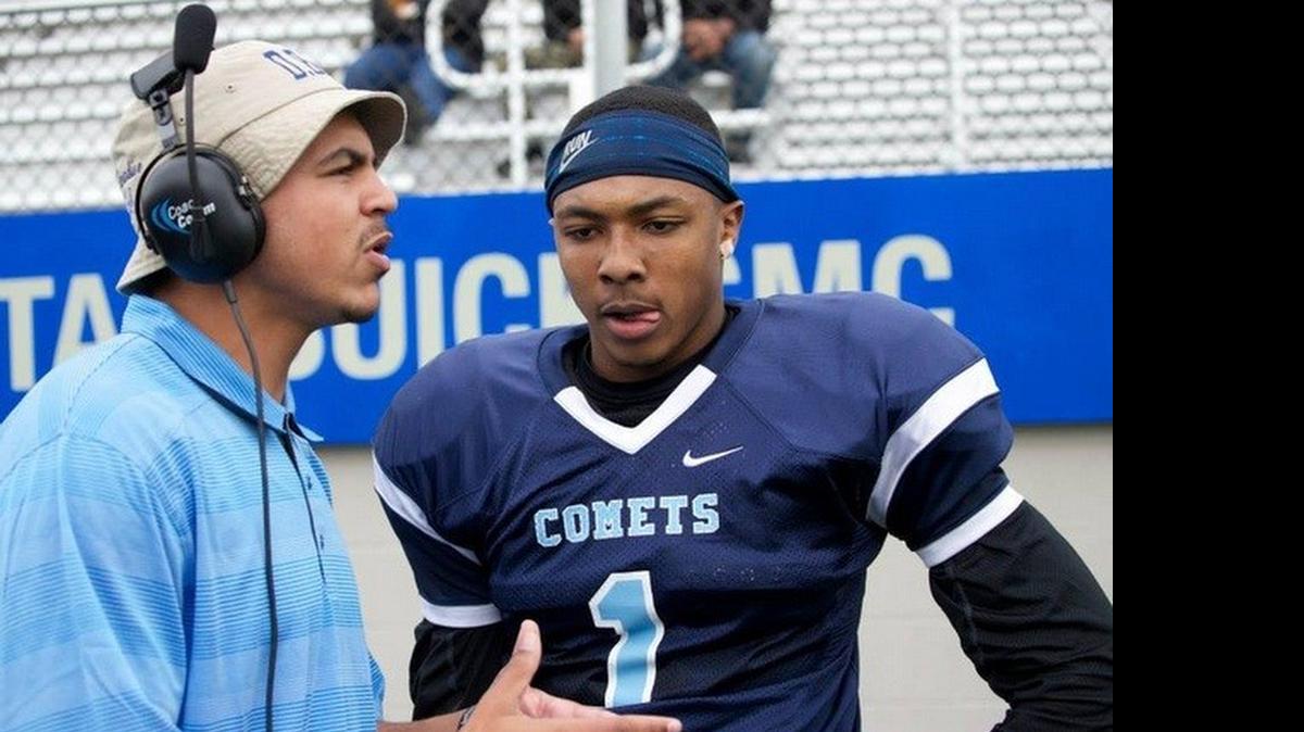 
Jonathan Banks shares a moment with his coach in between drives at Contra Costa College. The junior college transfer has orally committed to Kansas State.

