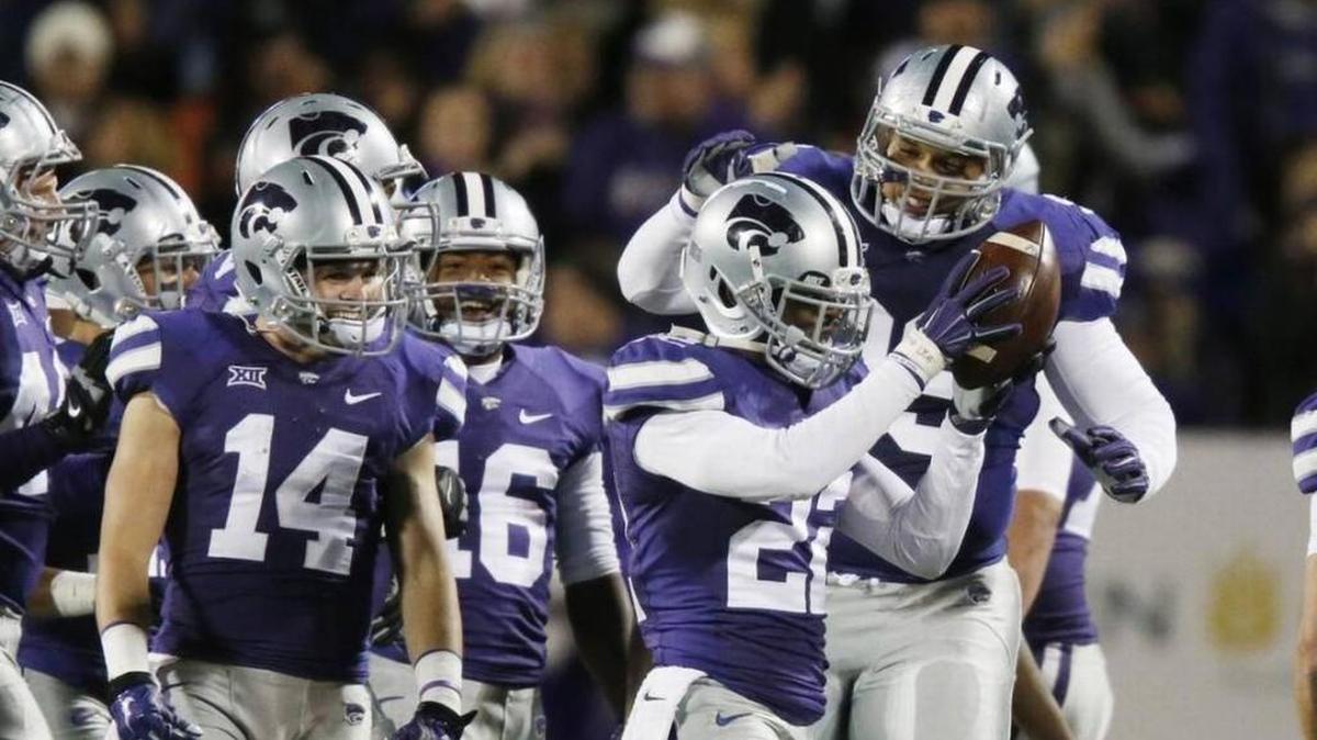 Kansas State safety Dante Barnett (22) celebrates after an interception against Oklahoma State in Manhattan in 2014.