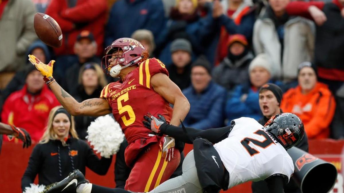 Iowa State wide receiver Allen Lazard catches a 22-yard touchdown pass in front of Oklahoma State cornerback Darius Curry on Nov. 11 in Ames, Iowa.