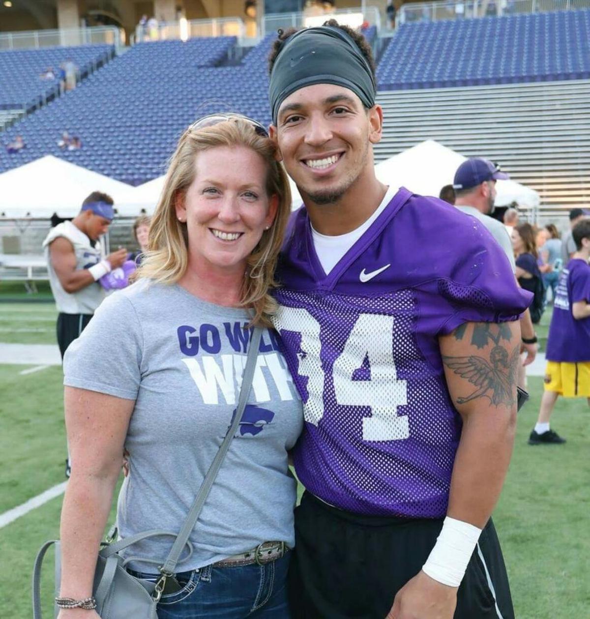 Alex Barnes poses for a picture with his mother, Jaimi Dodson, at K-State’s Fan Appreciation Day. (Courtesy Photo)