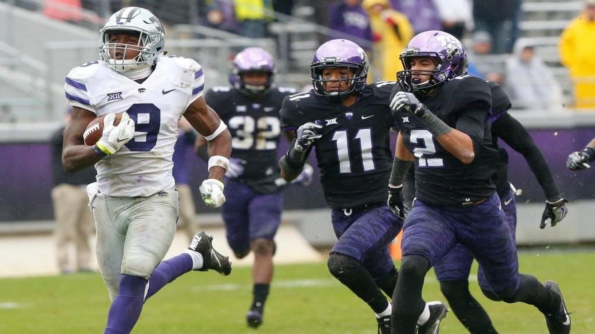 K-State wide receiver Byron Pringle runs for the end zone leaving TCU defenders in his wake.