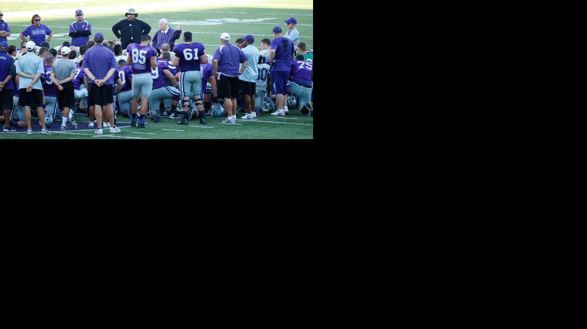 
K-State head coach Bill Snyder talks with his players after practice Saturday in Manhattan.
