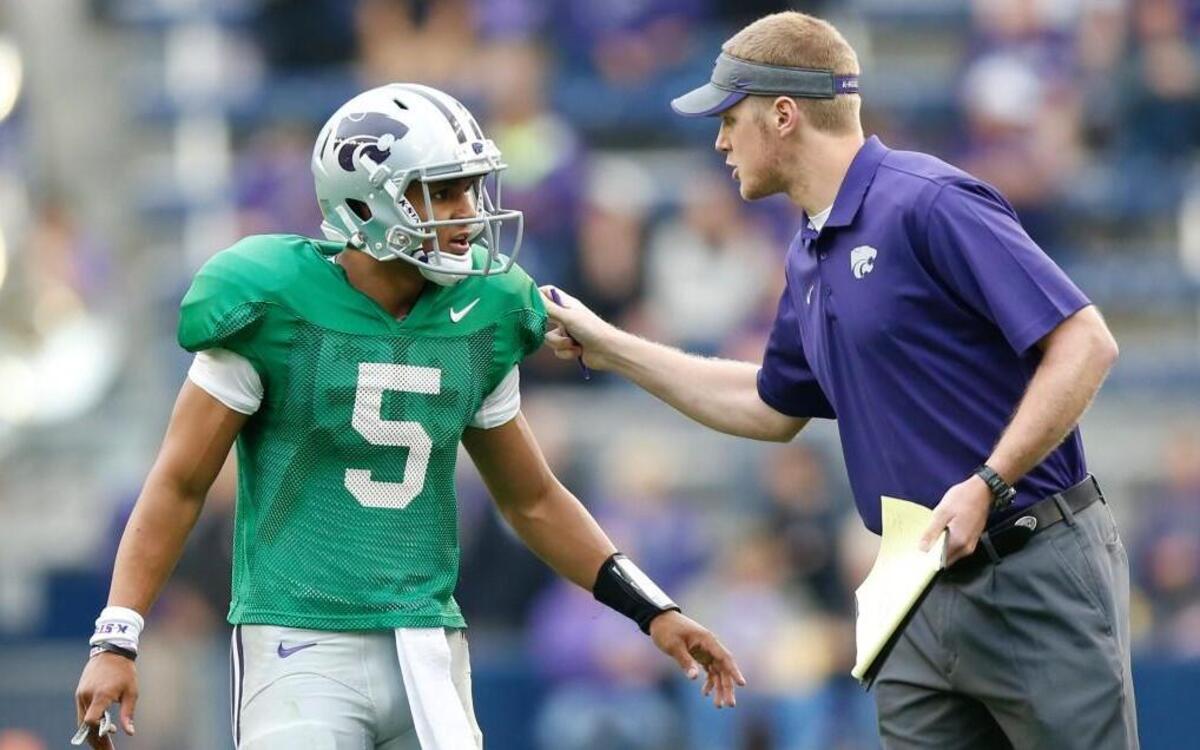 Quarterback Alex Delton gets some words from Collin Klein during the 2015 K-State spring game. Klein is back on the staff after a year at Northern Iowa.