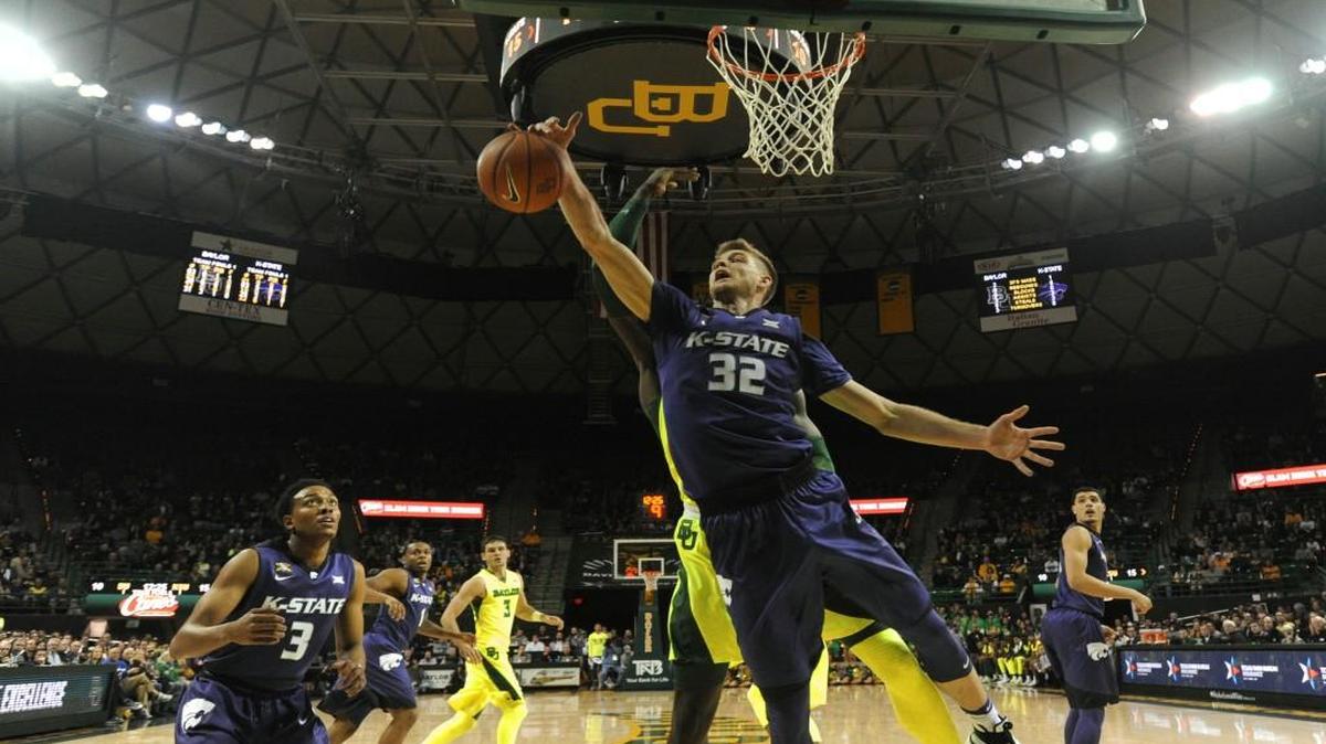 Kansas State forward Dean Wade reaches for a rebound over Baylor forward Johnathan Motley in the second half Saturday in Waco, Texas.