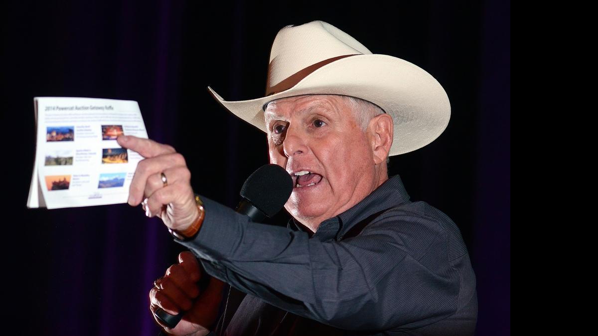 
Lon Floyd auctions items during the Ahearn Fund's Powercat Auction in 2014.
