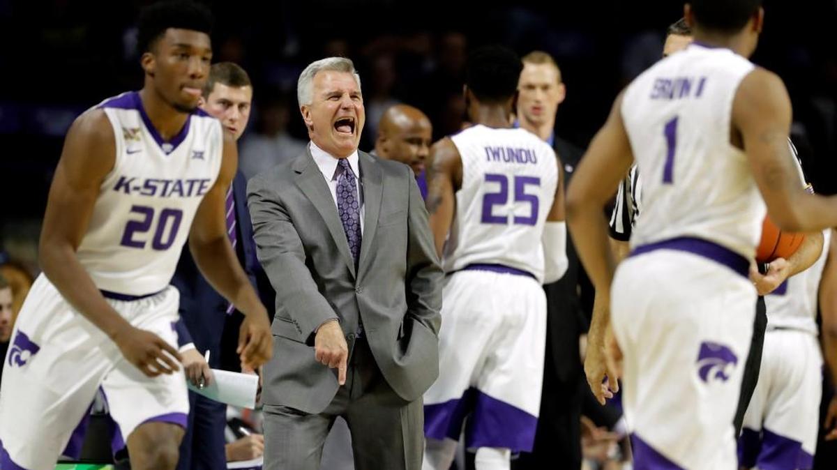 Kansas State coach Bruce Weber talks to his players at Bramlage Coliseum. (AP Photo/Charlie Riedel)