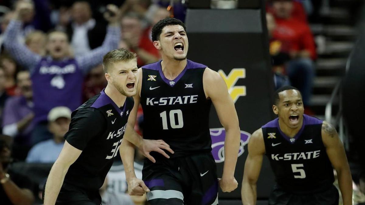 Kansas State players Dean Wade, Isaiah Maurice and Barry Brown show emotion against West Virginia in the semifinal of the Big 12 tournament on Friday night in Kansas City, Mo.