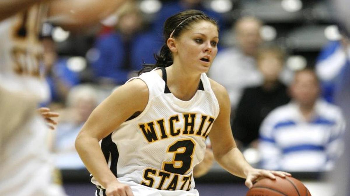 WSU's Jacie Hoyt brings the ball up court against Drake.