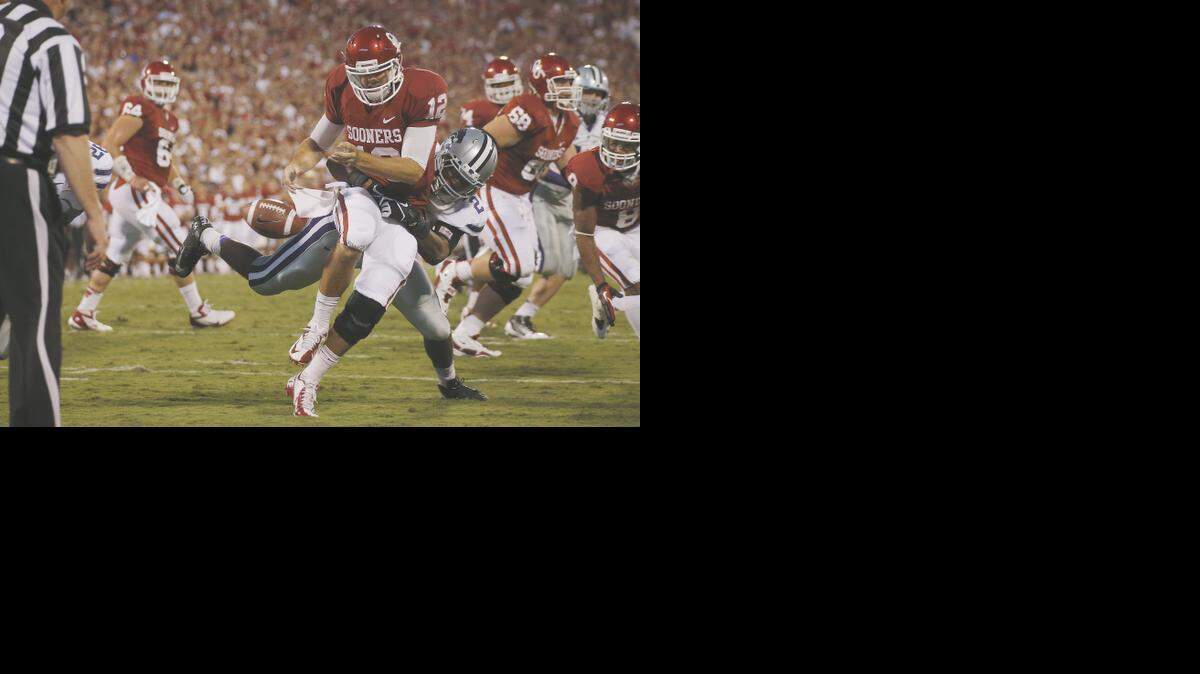 
Justin Tuggle sacks Landry Jones, forcing a fumble in a Kansas State victory over Oklahoma in 2012.
