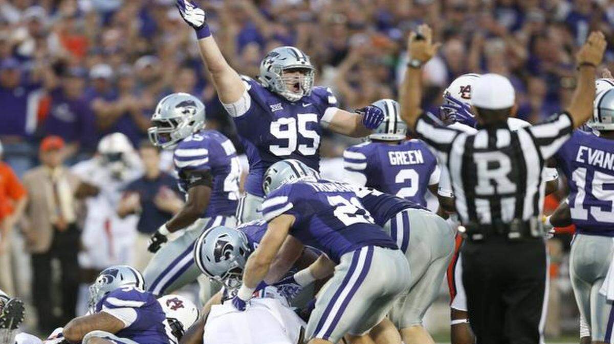 
K-State defensive lineman Travis Britz (95) signals K-State recovery of a fumble against Auburn on Sept. 18.

