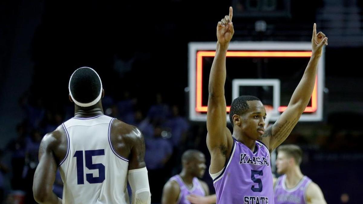 Kansas State's Barry Brown, right, celebrates at the end of Saturday’s win over TCU in Manhattan.