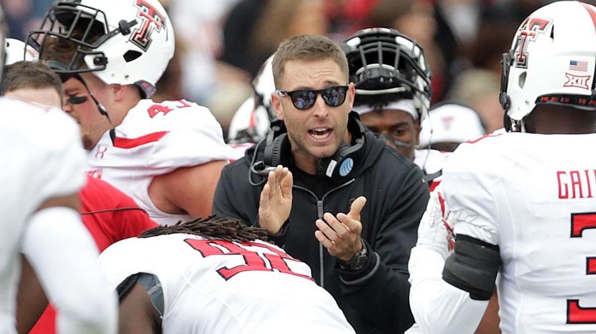 
Texas Tech coach Kliff Kingsbury claps during a game against West Virginia last season.
