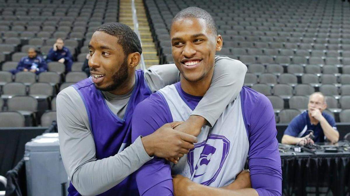 Kansas State players Omari Lawrence, left, and Jordan Henriquez play around before practice at Sprint (now T-Mobile) Center on March 21, 2013.