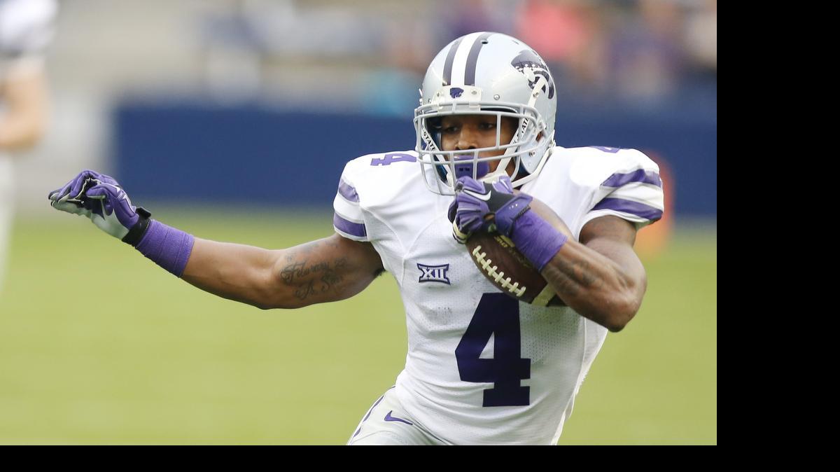 
K-State wide receiver Dominique Heath returns a punt at the Saturday’s spring game in Kansas City, Kan.

