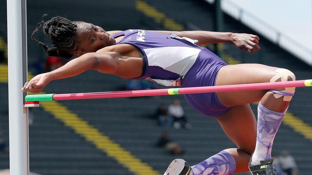 Akela Jones clears the bar while competing for Kansas State.