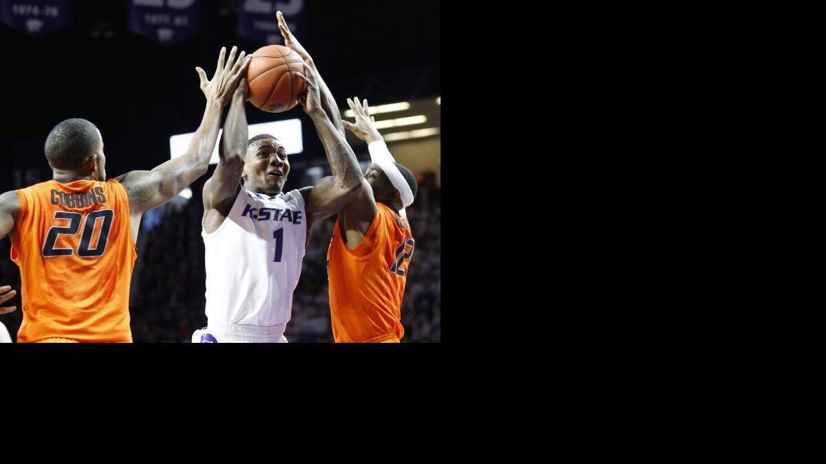 
K-State guard Jevon Thomas (1) drives for the basket during first-half action Saturday in Manhattan as Kansas State took on Oklahoma State.
