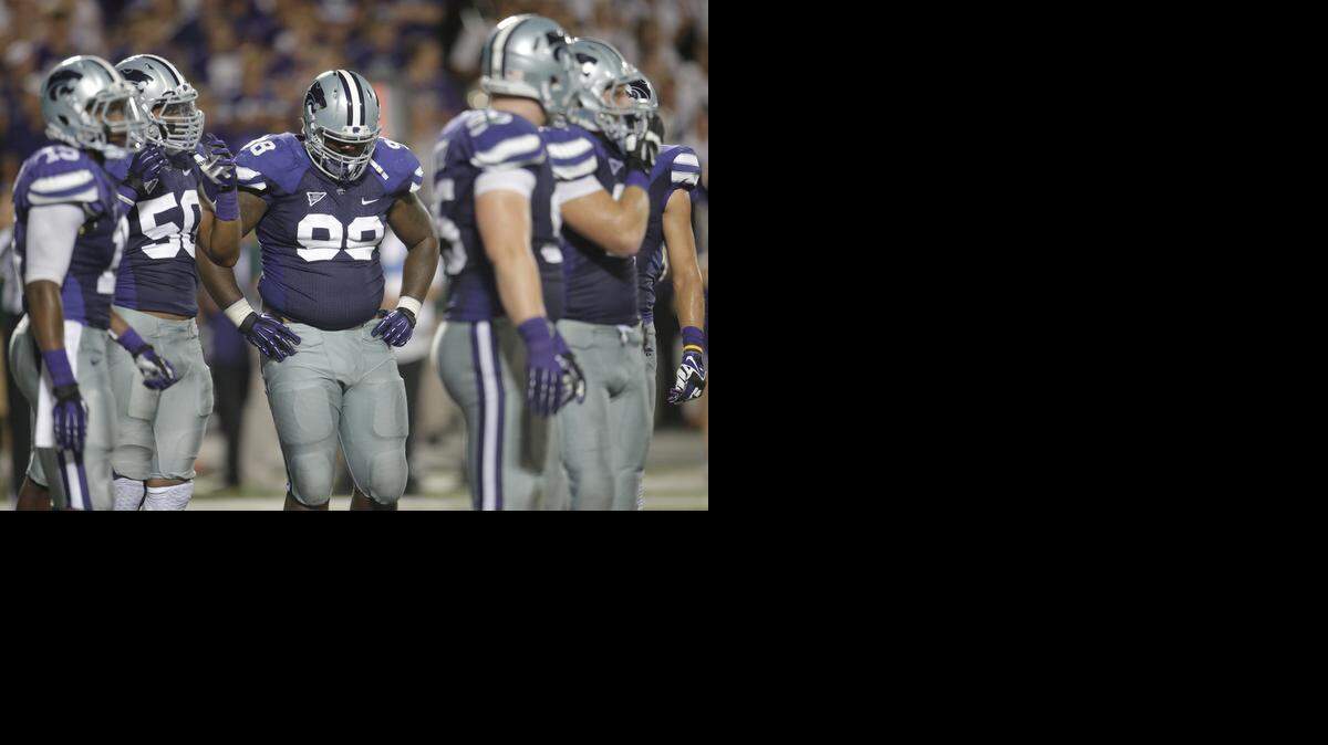 
K-State defensive lineman Chaquil Reed (98) reacts after North Dakota State scored the go-ahead touchdown last season in Manhattan.
