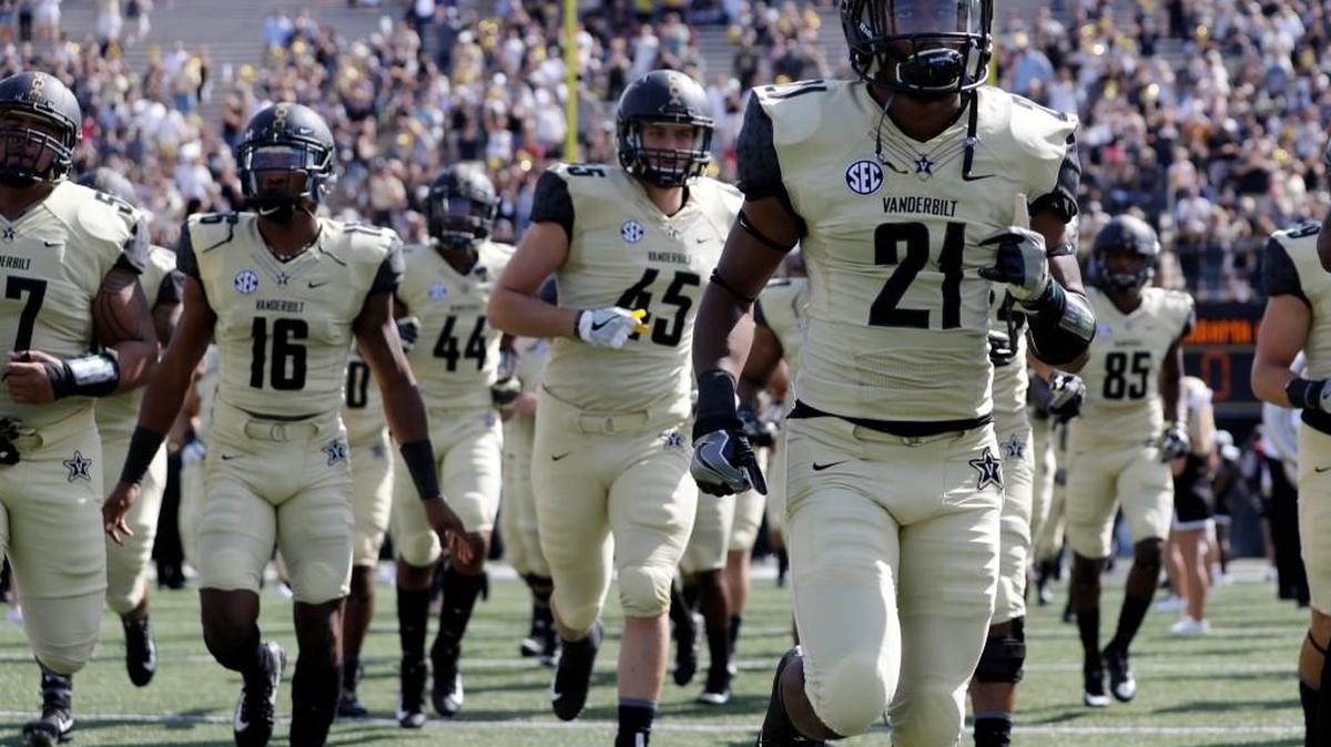 Vanderbilt defensive back Donovan Sheffield (21) and teammates take the field for an NCAA college football game against Alabama A&M Saturday, Sept. 9, 2017, in Nashville, Tenn. (AP Photo/Mark Humphrey)