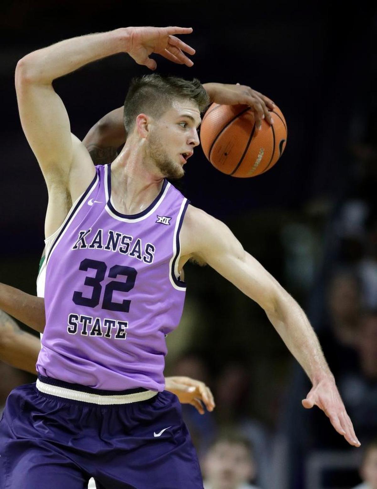 Kansas State’s Dean Wade reaches for the ball against Baylor during the first half Saturday in Manhattan.