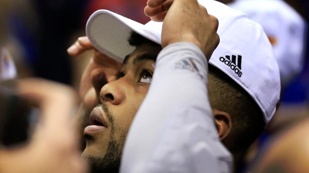 Kansas guard Frank Mason was named Big 12 Player of the Year by the Associated Press on Monday and earned The Sporting News national player of the year award.