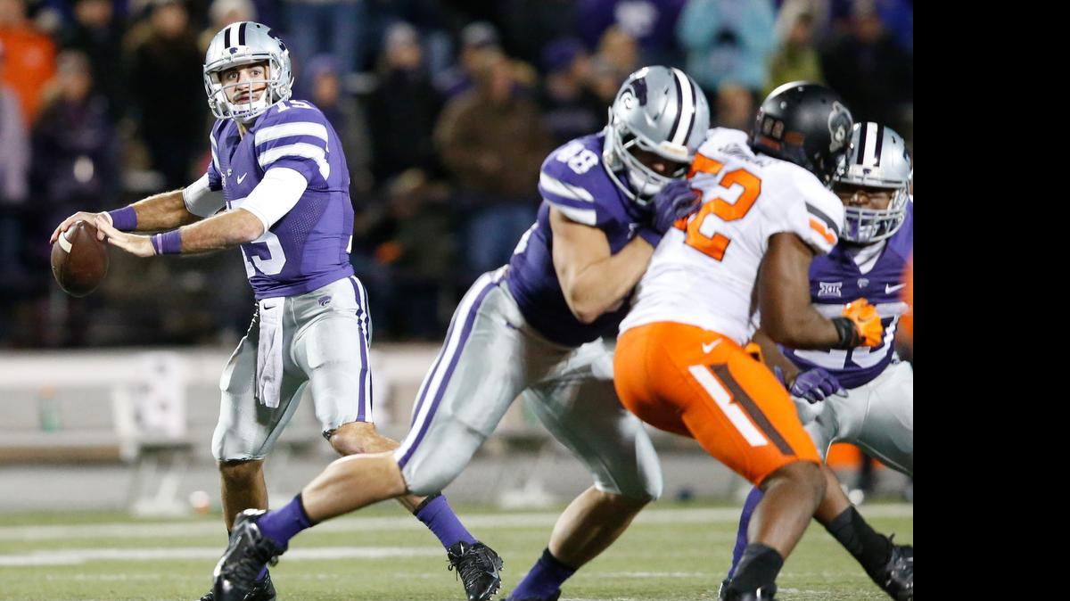 
K-State quarterback Jake Waters gets plenty of time to through the ball against Oklahoma State last season.

