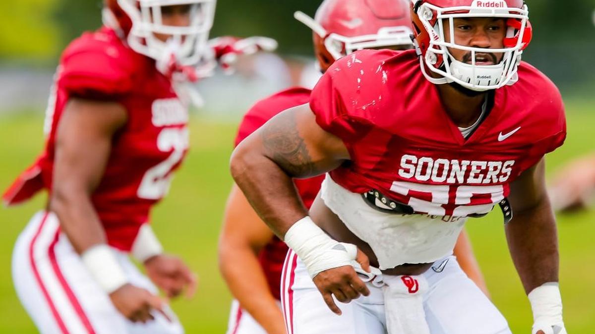 Oklahoma’s Samaje Perine, right, is the up-the-middle runner who rushed for 1349 yards last season.