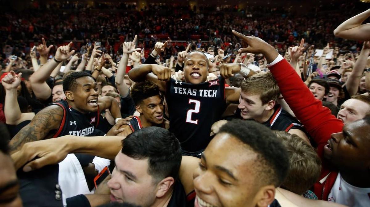 Texas Tech's Devon Thomas sits on top of the crowd after a game in Lubbock, Texas. Texas Tech beat 65-63. (AP Photo/Brad Tollefson)