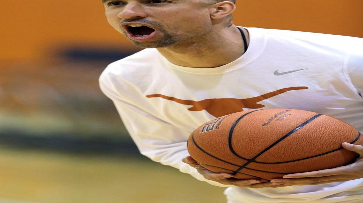 New Texas basketball coach Shaka Smart runs drills during a practice last month. Smart coached VCU to a Final Four and finally accepted an offer to move up into a power conference when Texas came calling.