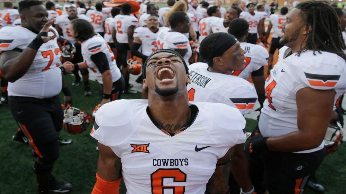 
Oklahoma State's Ashton Lampkin celebrates his team's win over Texas on Saturday in Austin.
