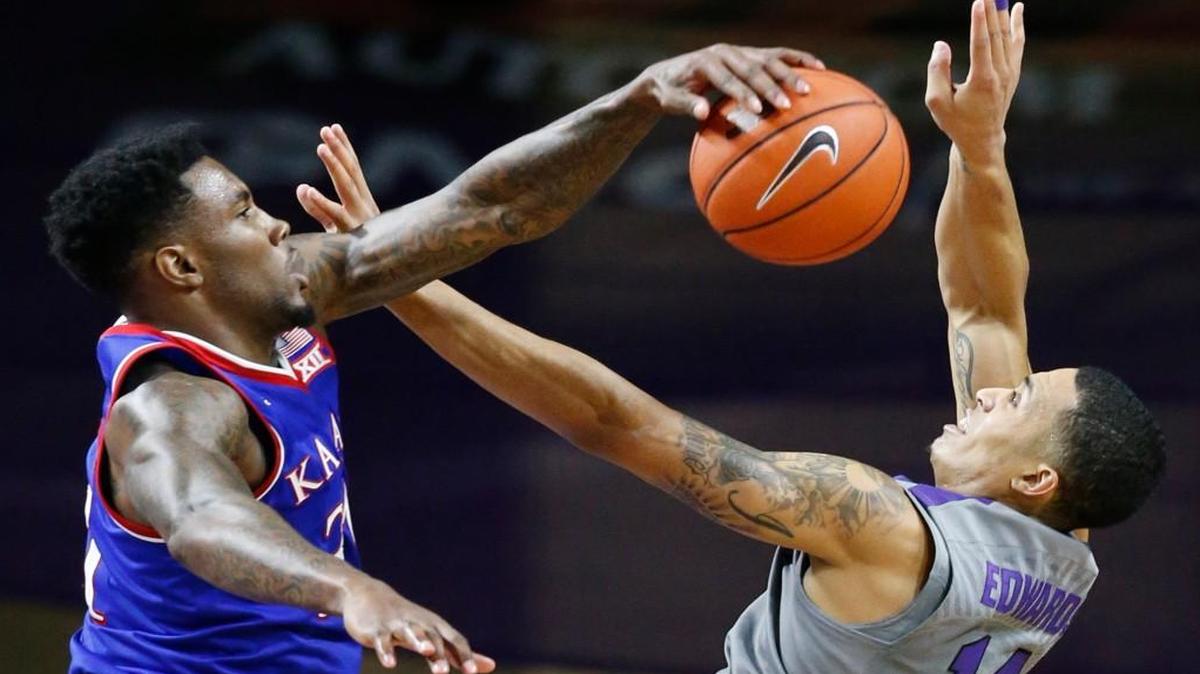 Kansas senior Jamari Traylor, left, has built a close relationship with coach Bill Self.