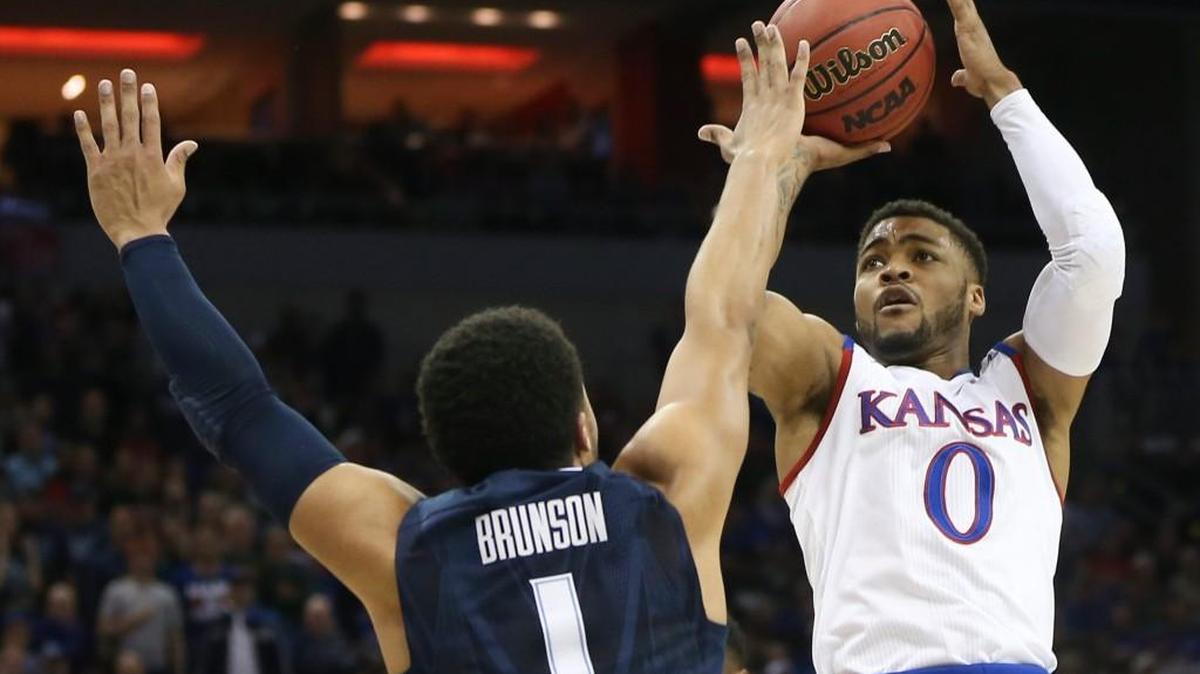 Kansas guard Frank Mason III shoots over Villanova guard Jalen Brunson during the Elite Eight game last March in Louisville, Ky.