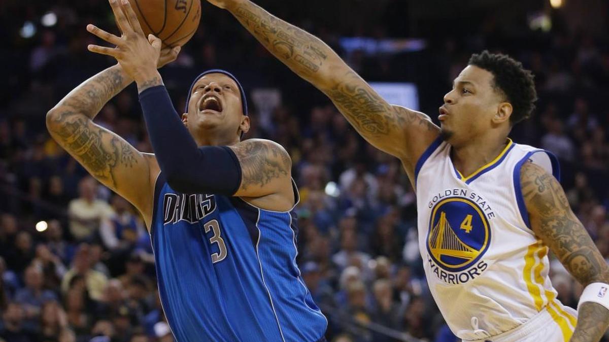 Brandon Rush, right, blocks a shot last season for Golden State.