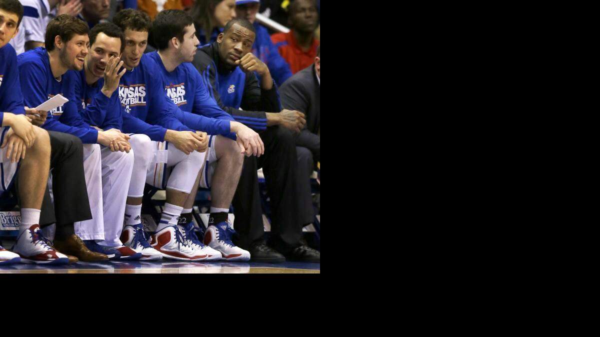 
Kansas forward Cliff Alexander, right, sits at the end of the bench during the Texas game at Allen Fieldhouse.
